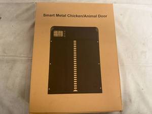lot 9 image: Automatic Metal Chicken Coop Door