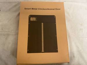 lot 10 image: Automatic Metal Chicken Coop Door