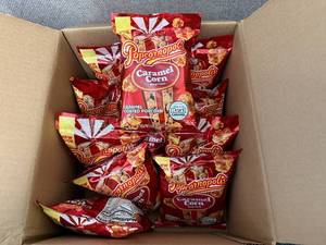 lot 115 image: 12 Pack of Popcornopolis Caramel Corn