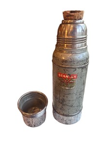 lot 60 image: Vintage Stanley Steel Lined Thermos with Cork Stopper and Cup