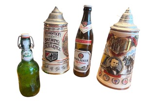 lot 83 image: German Beer Stein Pair with Grolsch and Paulaner Bottles