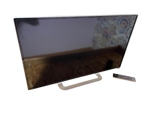 lot 98 image: Flat Screen LED TV with Stand and Remote