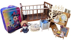 lot 99 image: Nursery Decor and Doll Collection Including Minnie Suitcase, Wood Cradle, Signs, and Figurines