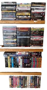 lot 139 image: Large Collection of DVDs and VHS Movies Assorted Genres