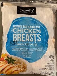 lot 12 image: Individually Frozen Boneless Skinless Chicken Breasts with Rib Meat 3lbs