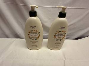 lot 95 image: 2x 18oz Lacura Oatmeal Body Lotion