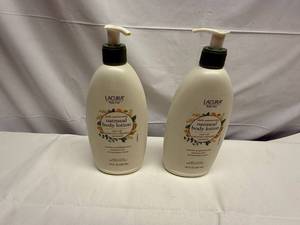 lot 96 image: 2x 18oz Lacura Oatmeal Body Lotion