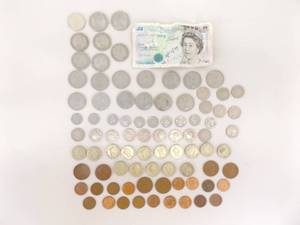 lot 98 image: Lot of 30 British Pounds  Travel Money (About $40 USD Worth)
