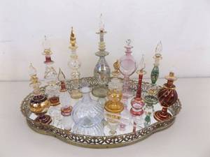 lot 44 image: Lot of Egyptian Perfume Bottles on Dresser Mirror