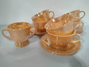 lot 53 image: Carnival Glass Peach Lustre CupsSaucersSugar Bowl