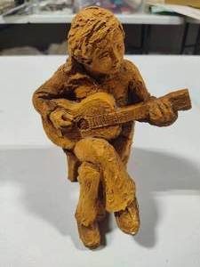 lot 81 image: Abbey Press Grail Art Guitar Player