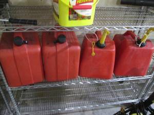 lot 235 image: 4-large plastic gas cans...