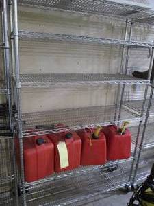 lot 241 image: Rolling metal bakers rack style 6-t...