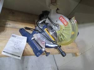 lot 255 image: Ryobi dual beveling Miter saw...