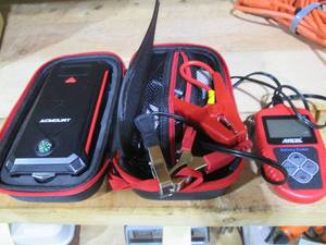 lot 258 image: Hand held Acmount jump starter and ...