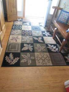 lot 50 image: Fall color and themed area rug appr...