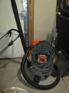 lot 143 image: Ridgid vacuum with filter and exten...