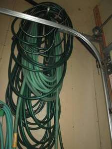 lot 146 image: Lot of good quality garden hoses...