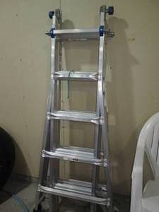 lot 148 image: Werner aluminum multi position ladd...
