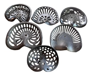 lot 85 image: Set of 6 Vintage Cast-Iron Tractor Seats