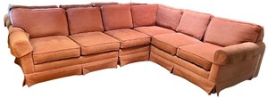 lot 11 image: Large Sectional Sofa with Rust-Colored Upholstery and Rolled Arms