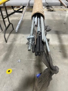 lot 4 image: 6 FT TUBE FULL OF 38 & 12 THREADED READY ROD