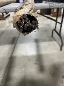 lot 5 image: 6FT TUBE FULL OF 38 THREADED READY ROD