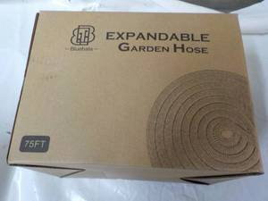 lot 154 image: Expandable Garden Hose...