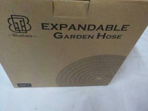 lot 166 image: Expandable Garden Hose...