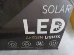 lot 186 image: 8 pack LED Solar Garden Lights...