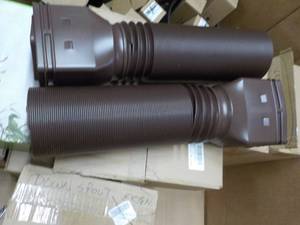 lot 193 image: 2 Brown Downspout Extensions...