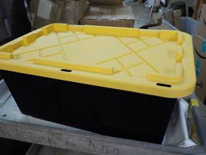 lot 67 image: Black and Yellow Tote 23  gallon...