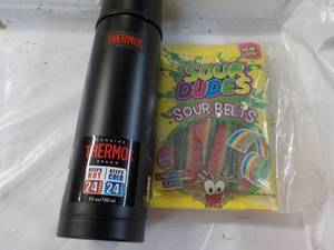 lot 266 image: Thermos and Sour Dudes...