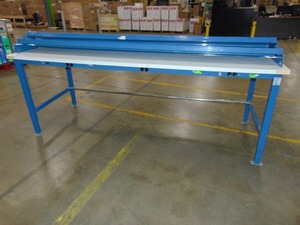 lot 38 image: 30x96 Inch Global Industrial Adjustable Height Heavy Duty Workbenches with Power with 2 Shelfs