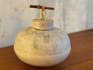 lot 8 image: Raku Fired Lidded Vessel with Crackle Glaze and Decorative Handle