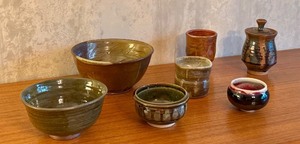 lot 35 image: Set of 7 Artisan Pottery Bowls and Cups