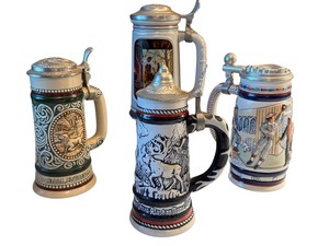lot 54R image: Set of 4 Vintage Avon Collectible Beer Steins with Pewter Lids