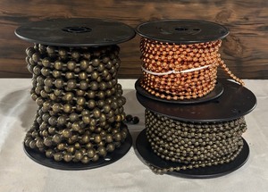 lot 31 image: Metal Beaded Chain Spools