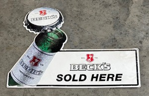 lot 104 image: Metal Becks Beer Sold Here Sign
