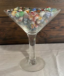 lot 126 image: Vintage Marbles in Large Martini Style Glass