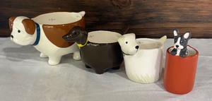 lot 133 image: Four Adorable Dog Motif Measuring Cups by One Hundred 80 Degrees