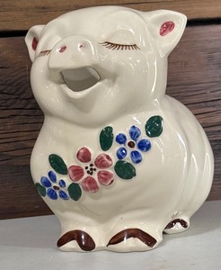 lot 70 image: Vintage Patented Smiley Shawnee Pottery Pitcher