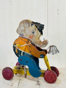 lot 43 image: Vintage Fisher-Price Pull Toy Elephant on a Scooter