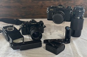 lot 210 image: Canon F-1 and A-1 Cameras with Accessories