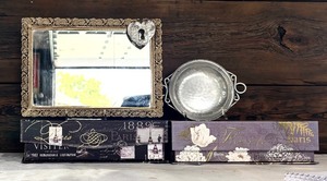 lot 293 image: Mixed Decor Lot with Ornate Mirror, Metal Tray, Heart Pendant, and Abbington Park Summer Paris Collector Boxes