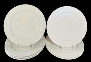 lot 361 image: A Set of 8 Assorted Ivory Dinner Plates