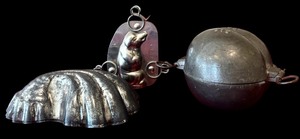 lot 383 image: Three Vintage Metal Molds including Chocolate Molds