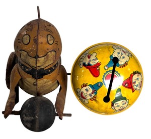 lot 363 image: Vintage Marx Pressed Tin Wind Up Toy, Sandy from Little Orphan Annie and Vintage Lithograph Baby Rattle