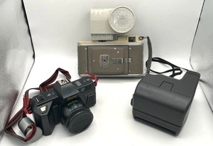 lot 16 image: Vintage Camera Lot - Polaroid 600 One Step, Polaroid Land Camera Model 80A, and Hachi KX-66 Film Camera