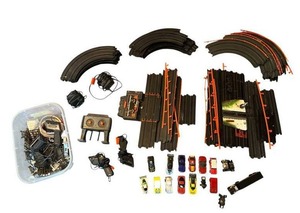 lot 62 image: Vintage Slot Cars and Racing Track in Working Condition